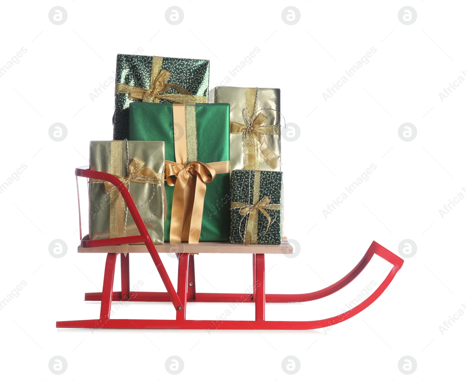 Photo of Sleigh with Christmas gifts on white background