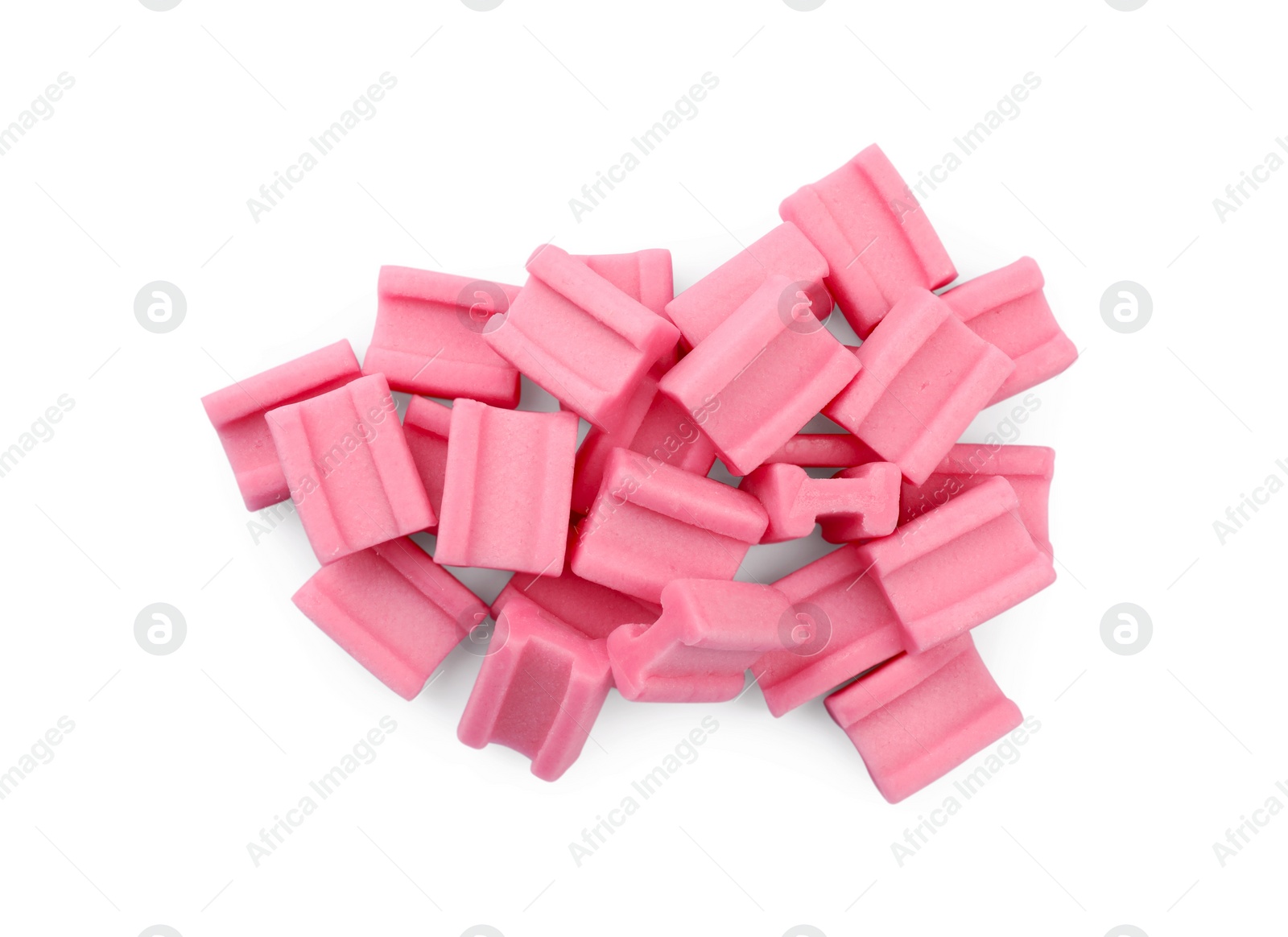 Photo of Pile of tasty pink chewing gums on white background, top view