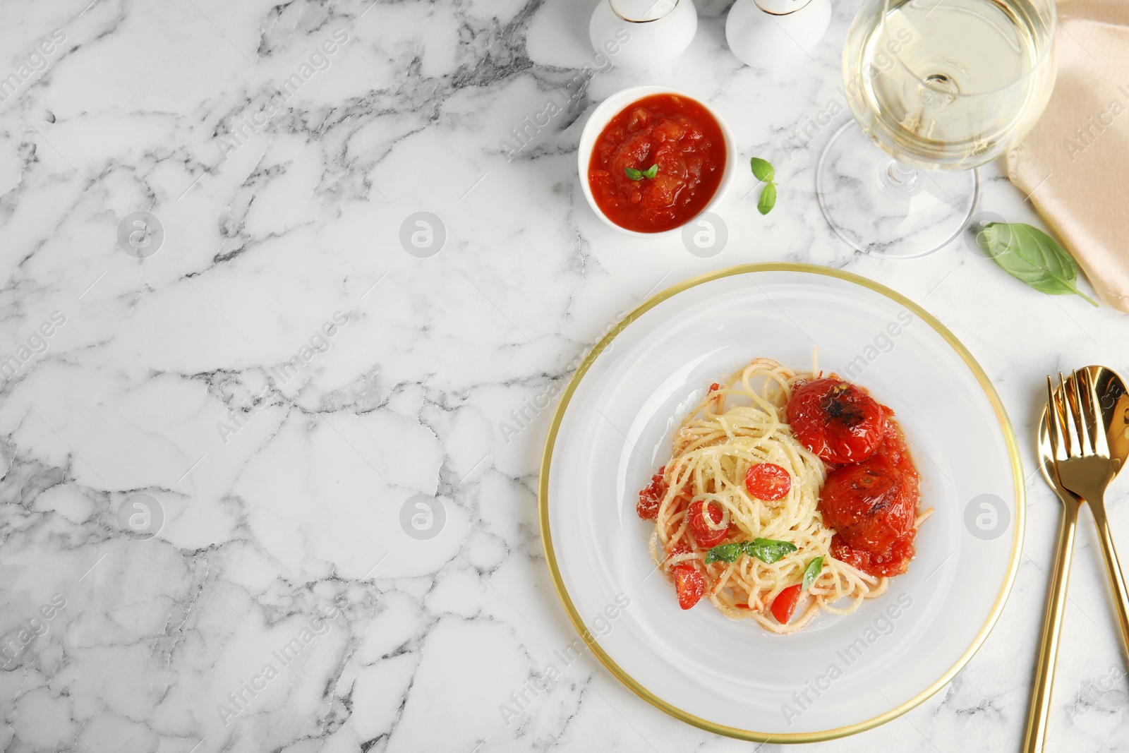 Photo of Flat lay composition with tasty pasta on white marble table, space for text