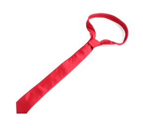 Photo of One red necktie isolated on white, above view