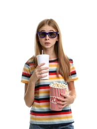 Photo of Emotional teenage girl with 3D glasses, popcorn and beverage during cinema show on white background