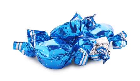 Photo of Candies in light blue wrappers isolated on white