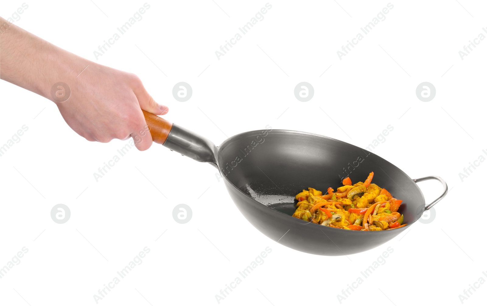 Photo of Stir-fry. Woman holding wok with cooked vegetables and chicken on white background, closeup