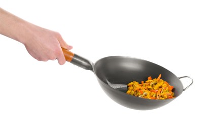 Photo of Stir-fry. Woman holding wok with cooked vegetables and chicken on white background, closeup