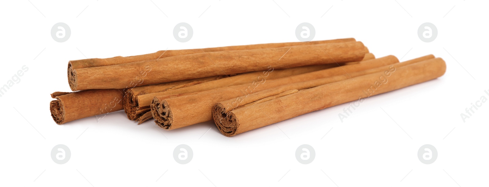 Photo of Aromatic dry cinnamon sticks on white background