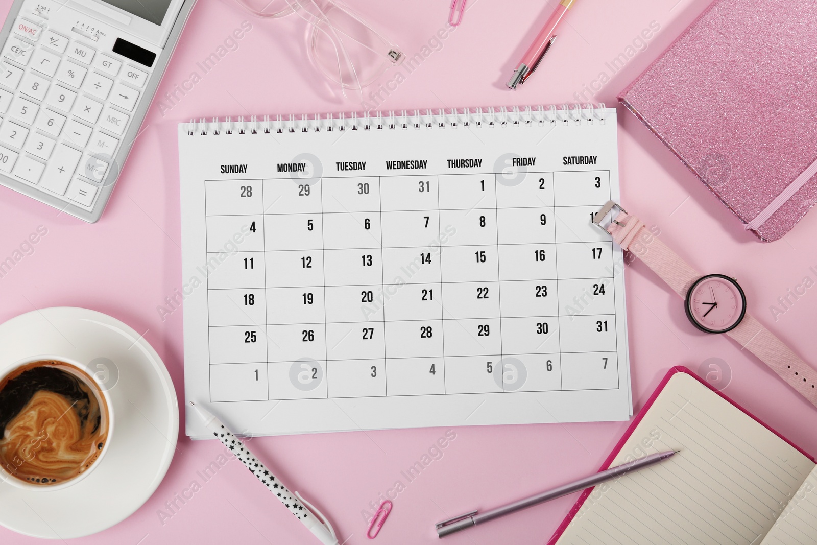 Photo of Flat lay composition with calendar on pink background