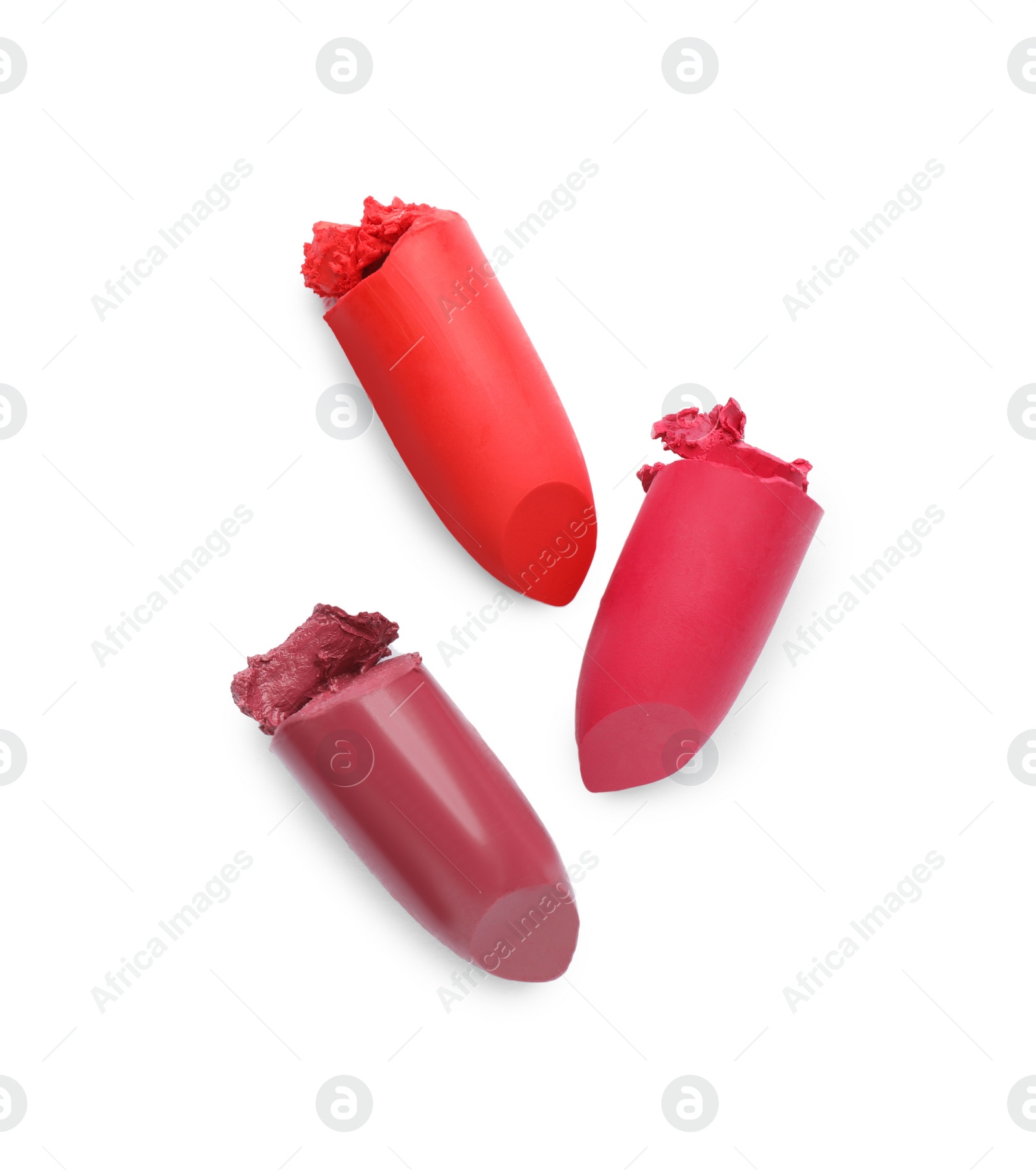 Photo of Different beautiful lipsticks on white background, top view