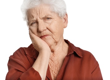 Photo of Elderly woman suffering from tooth ache on white background