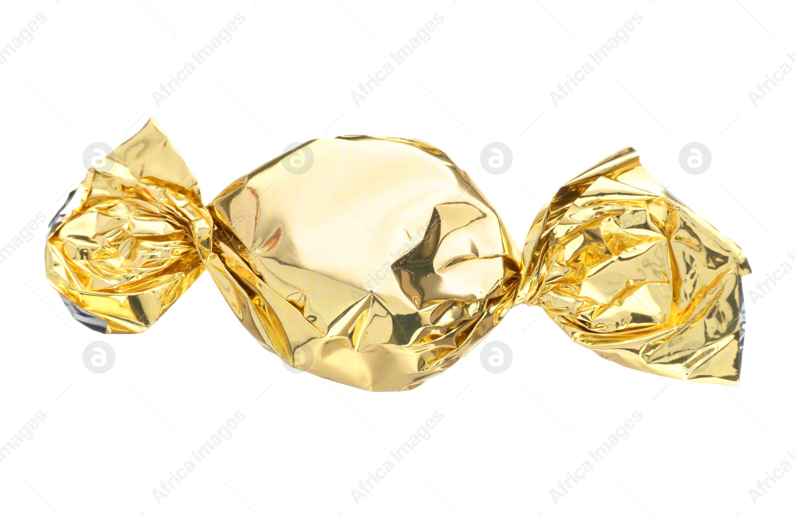 Photo of Candy in golden wrapper isolated on white
