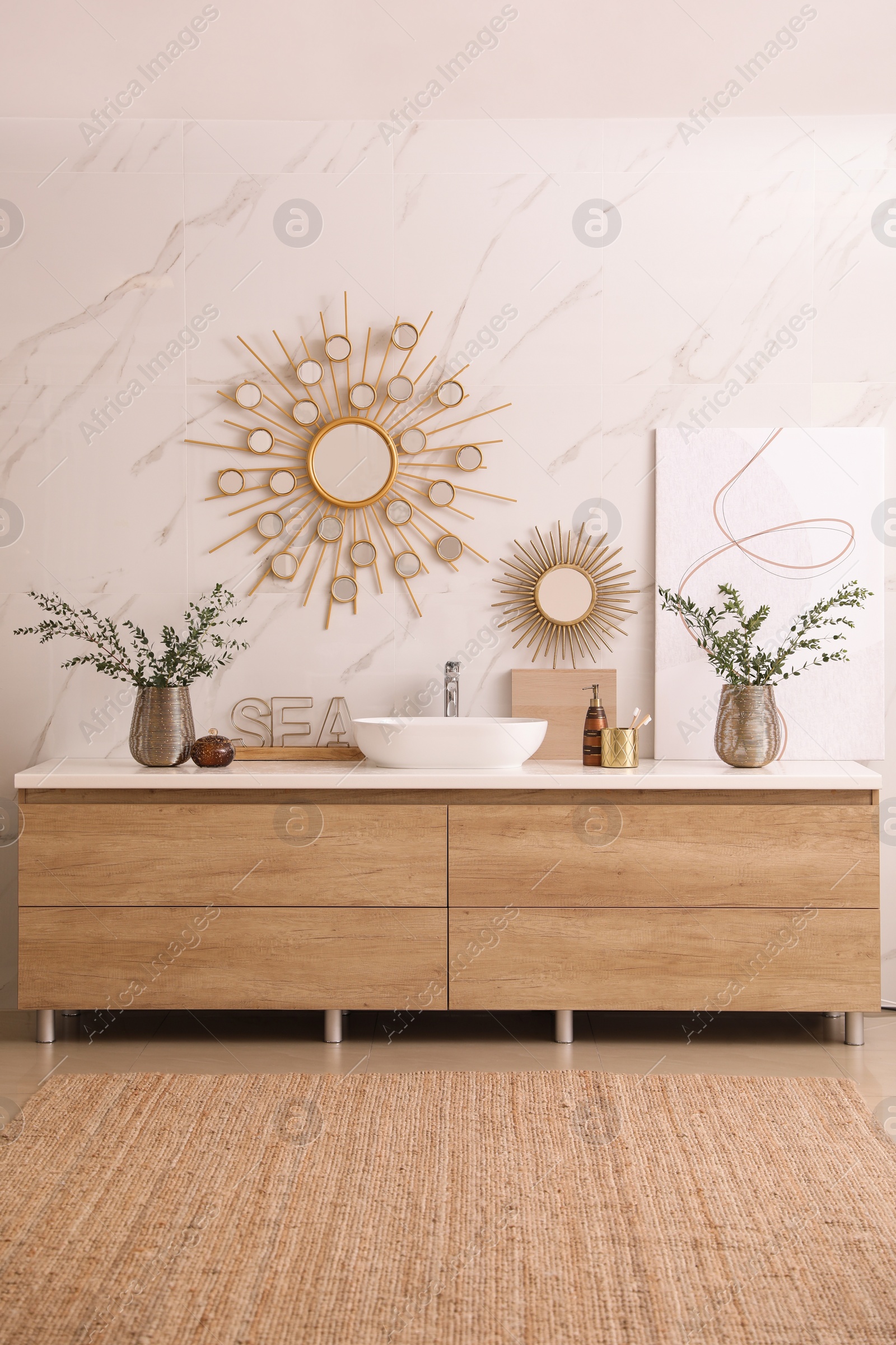 Photo of Modern bathroom interior with stylish mirror and vessel sink