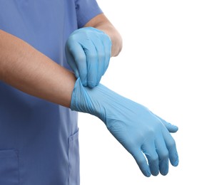 Doctor wearing light blue medical glove on white background, closeup