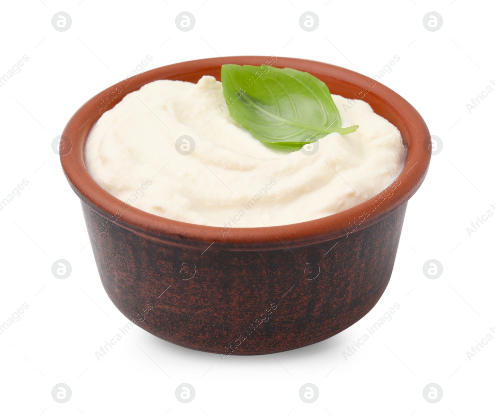 Photo of Delicious tofu sauce and basil leaf in bowl isolated on white