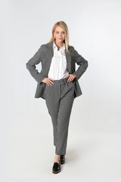 Photo of Full length portrait of young businesswoman on white background