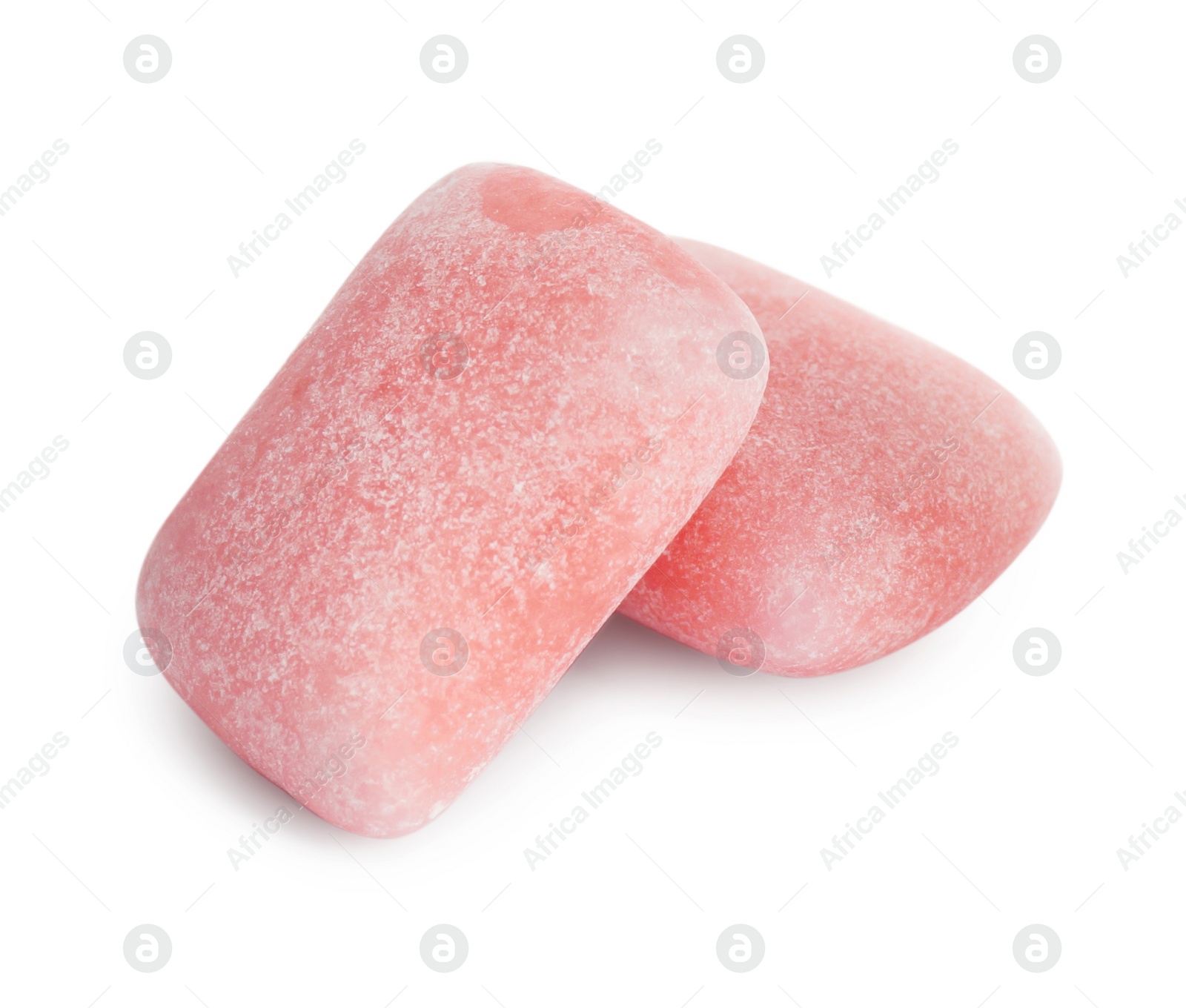 Photo of Tasty sweet chewing gums on white background