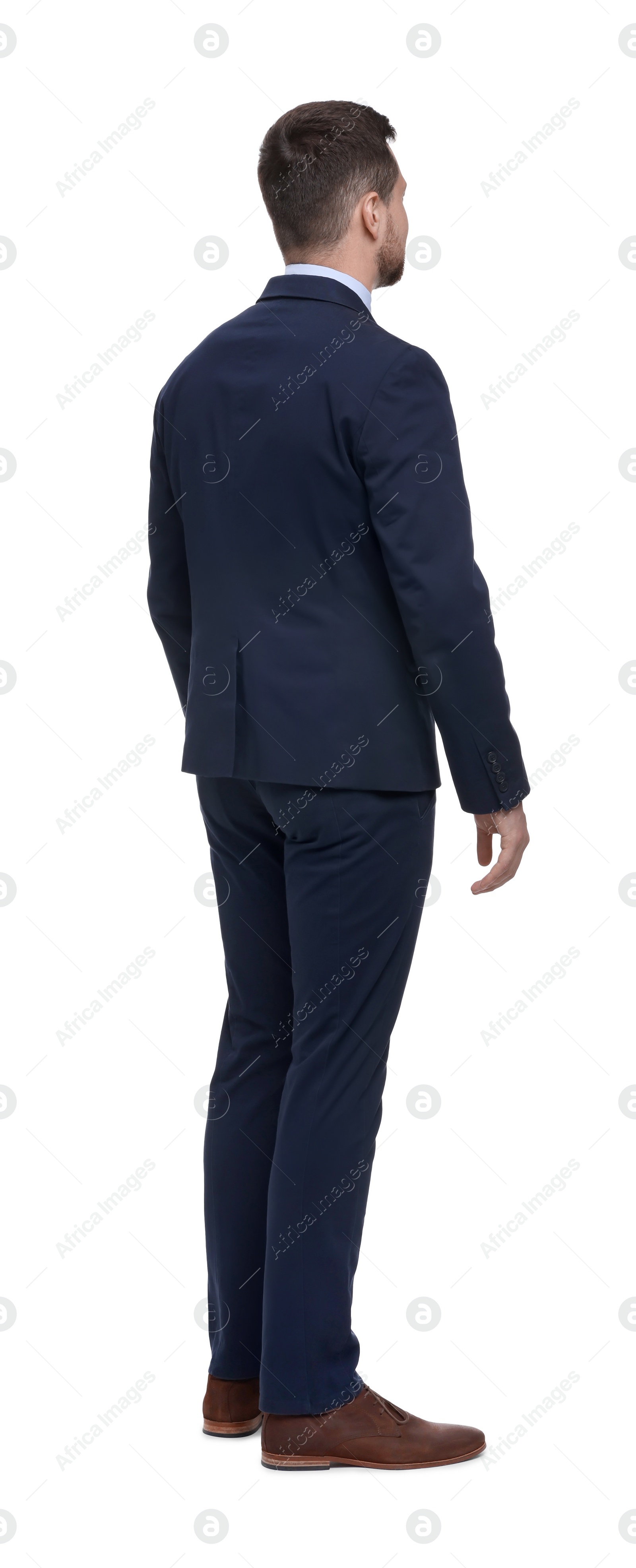 Photo of Businessman in suit standing on white background