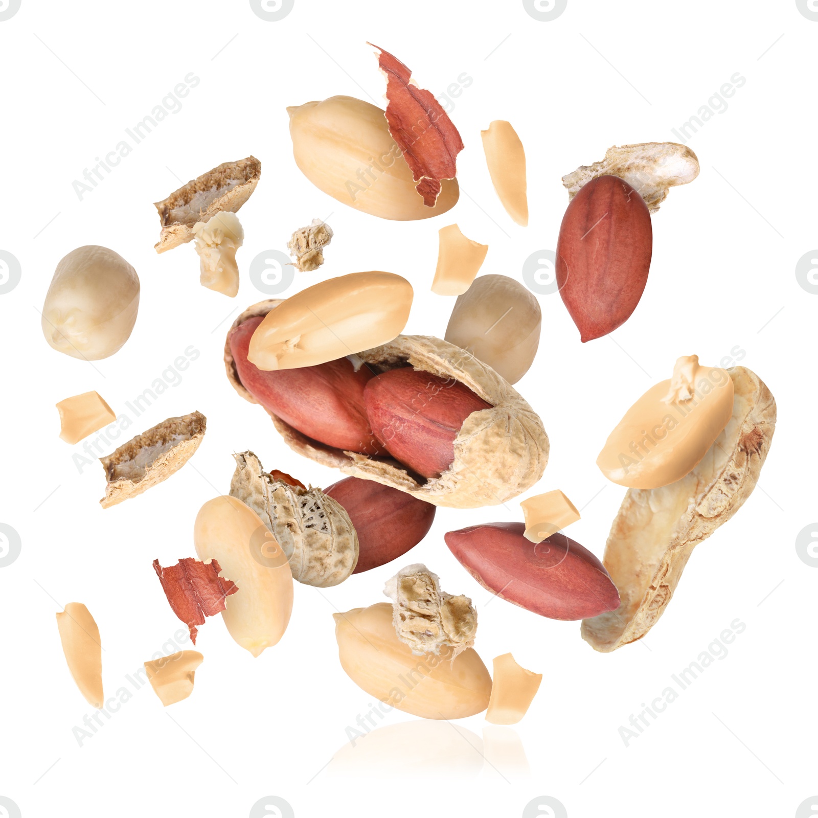 Image of Peanuts and crushed pod in air on white background