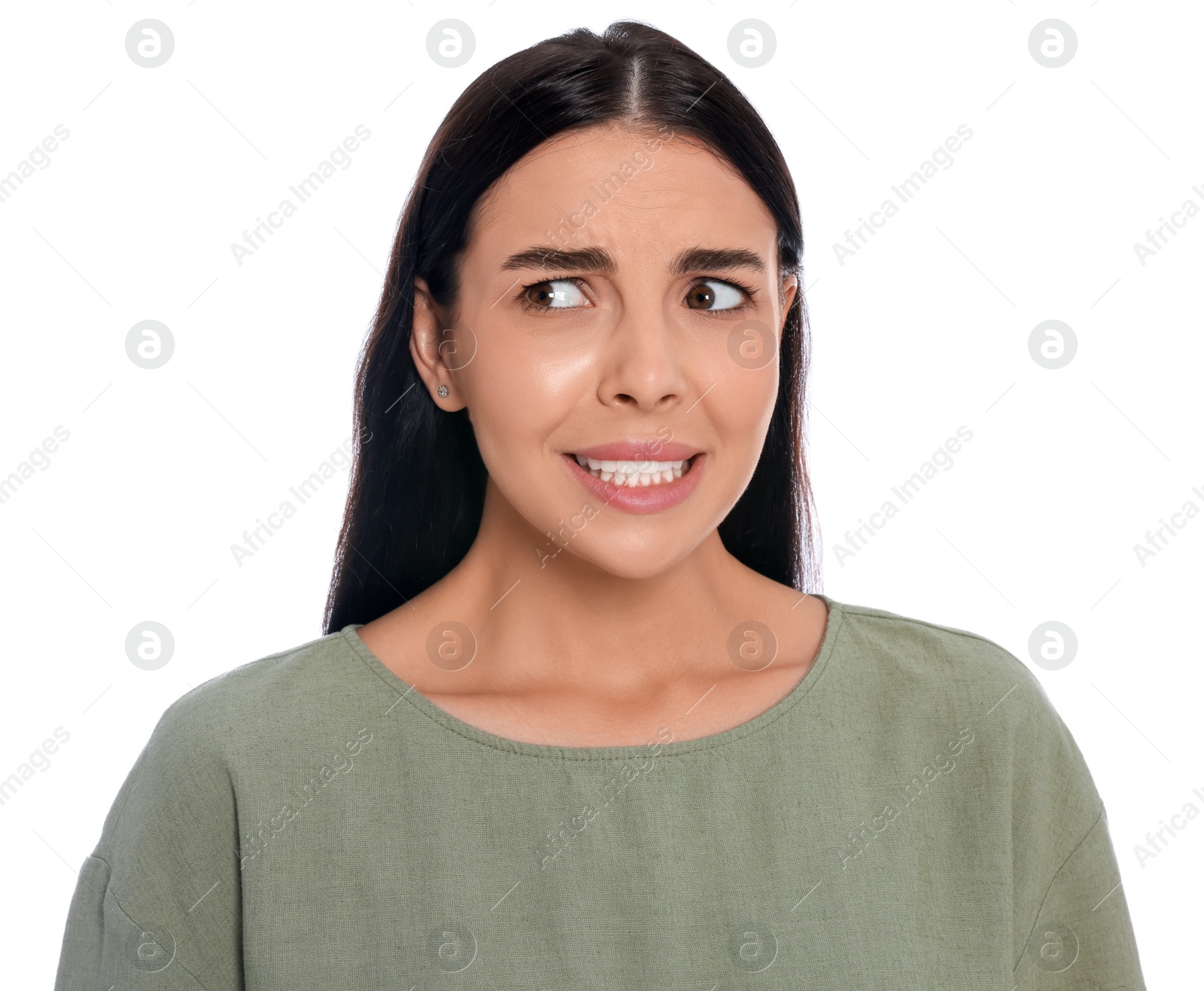 Photo of Embarrassed young woman in shirt on white background