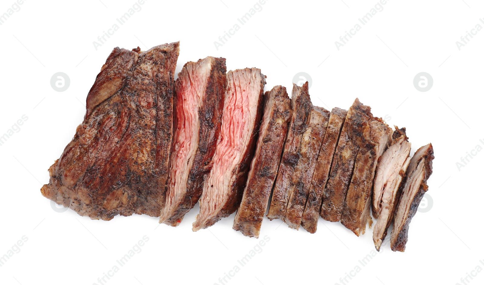 Photo of Pieces of tasty grilled beef meat isolated on white, top view