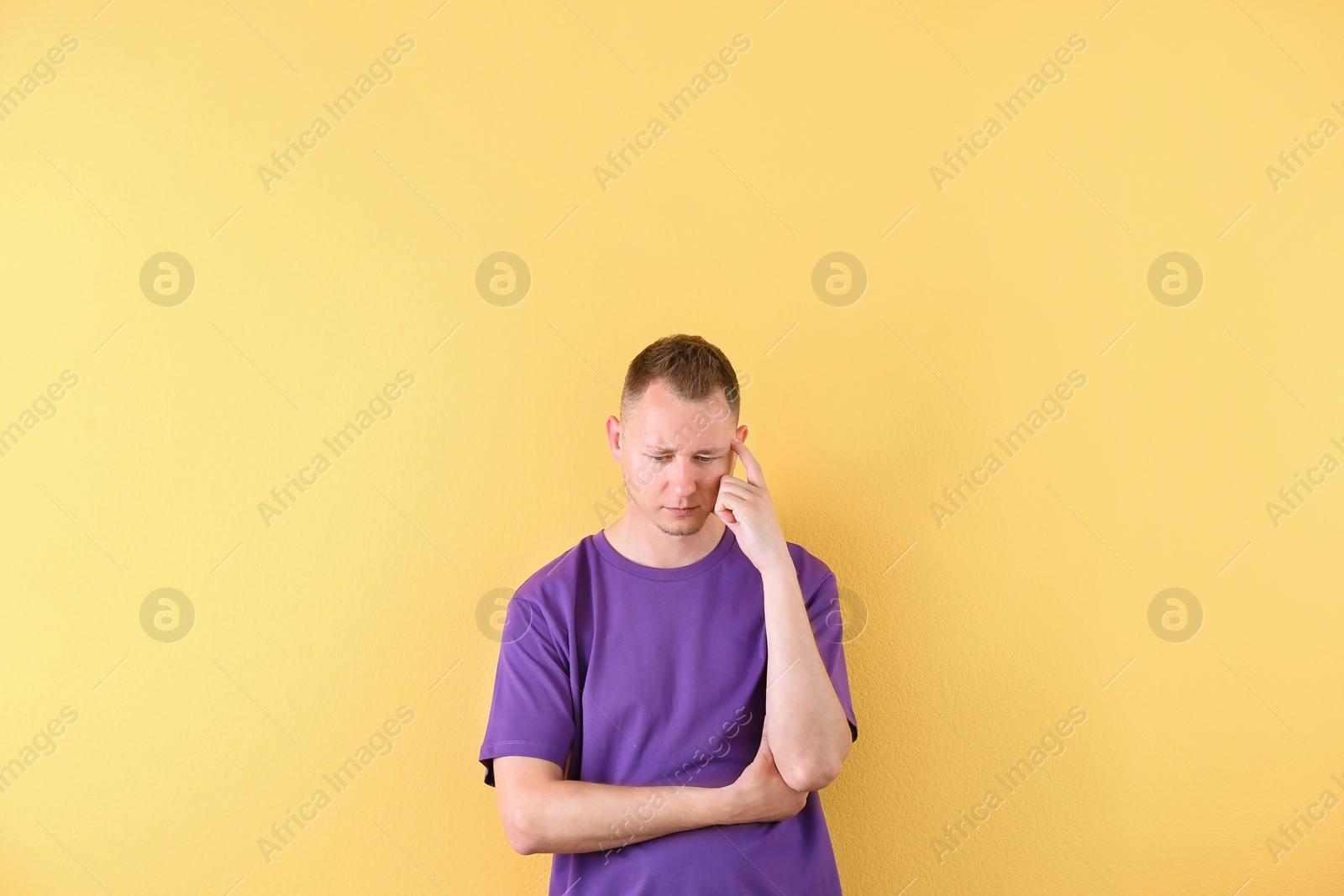 Photo of Portrait of handsome man on color background