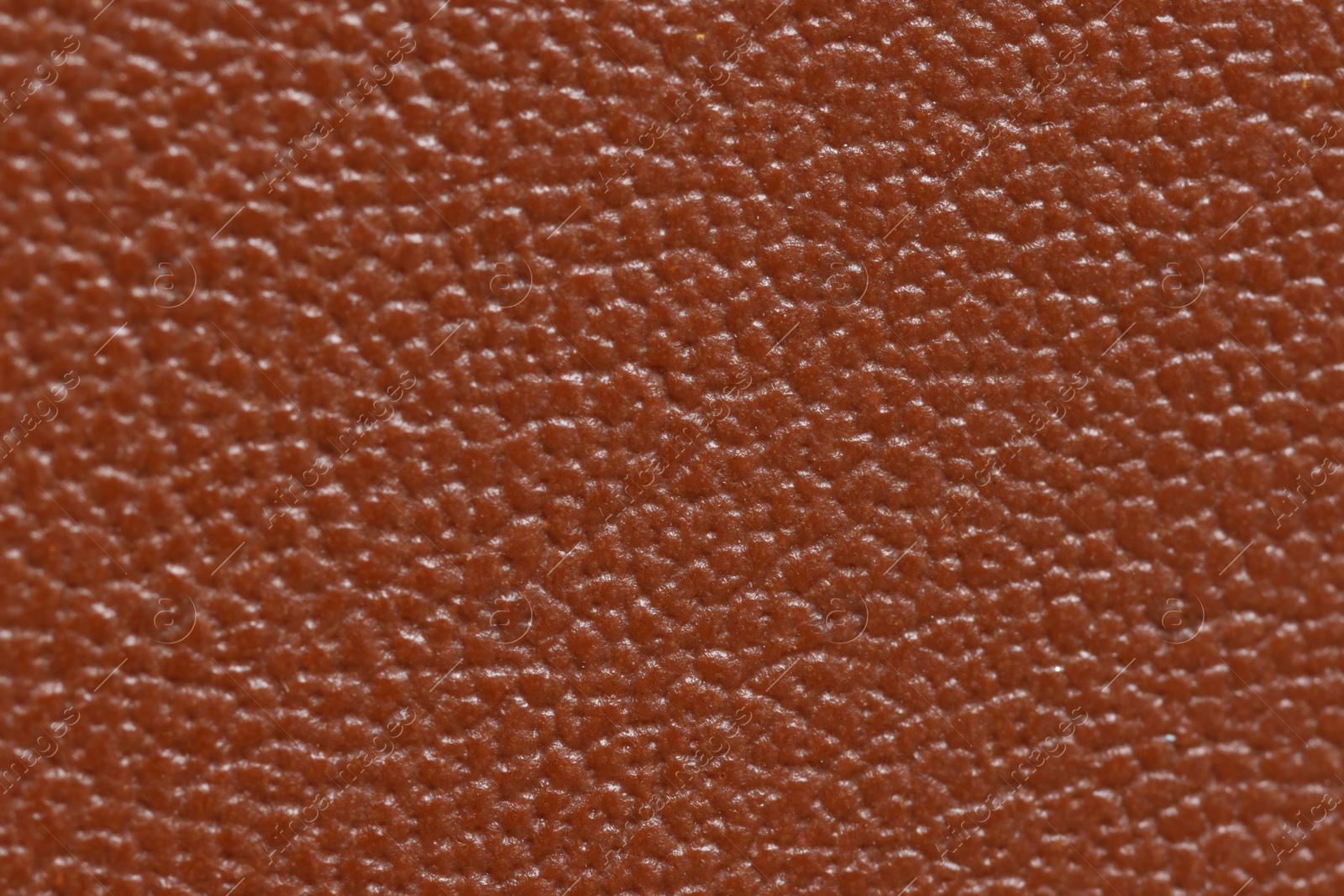 Photo of Brown natural leather as background, top view