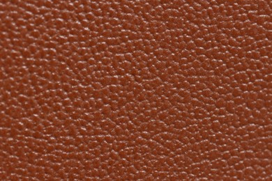 Photo of Brown natural leather as background, top view