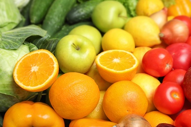 Photo of Colorful ripe fruits and vegetables as background, closeup