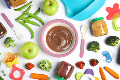 Flat lay composition with healthy baby food, ingredients and accessories on white background