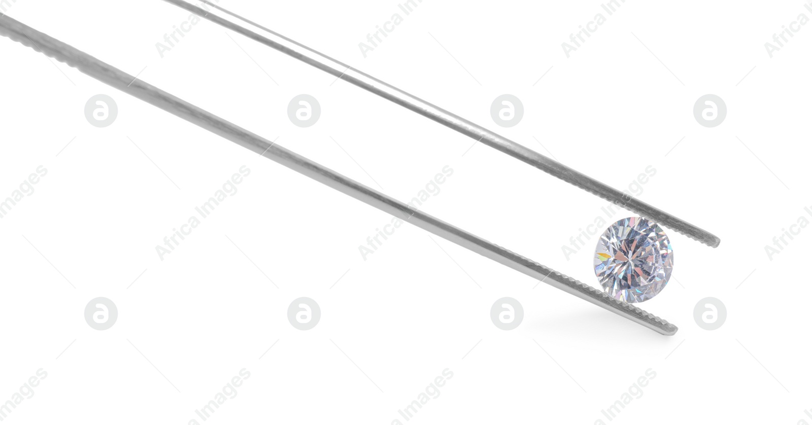 Photo of Tweezers with beautiful shiny diamond isolated on white