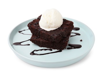 Photo of Tasty brownies with ice cream and chocolate sauce isolated on white