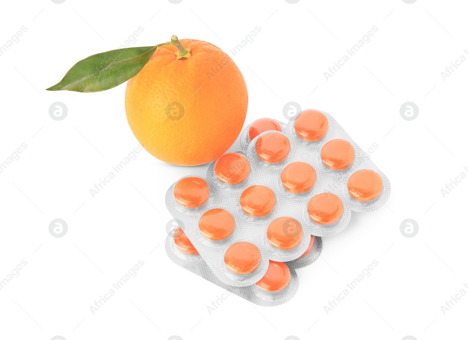 Photo of Fresh orange and blisters with cough drops isolated on white