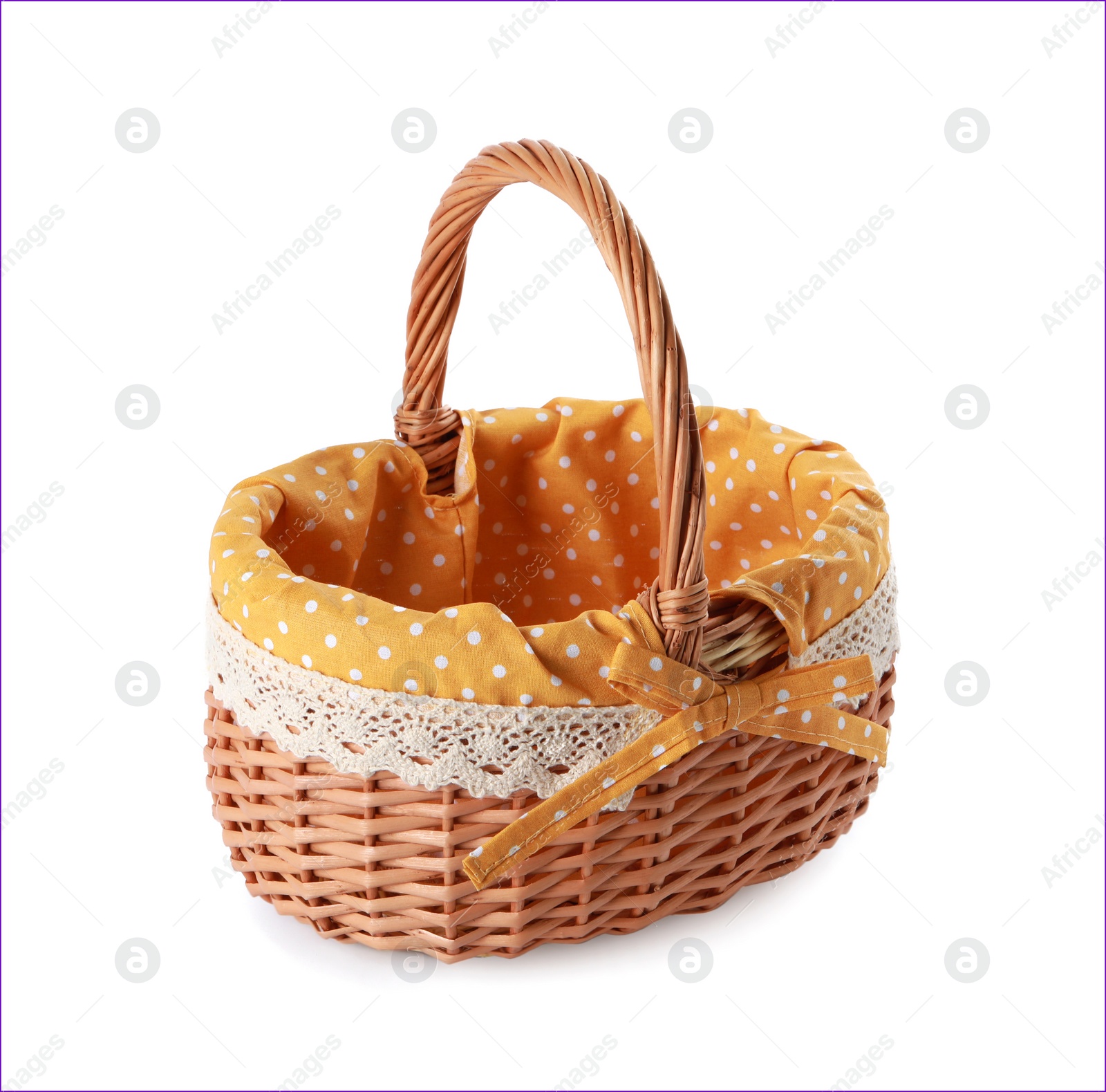 Photo of Empty Easter wicker basket with decorative fabric isolated on white