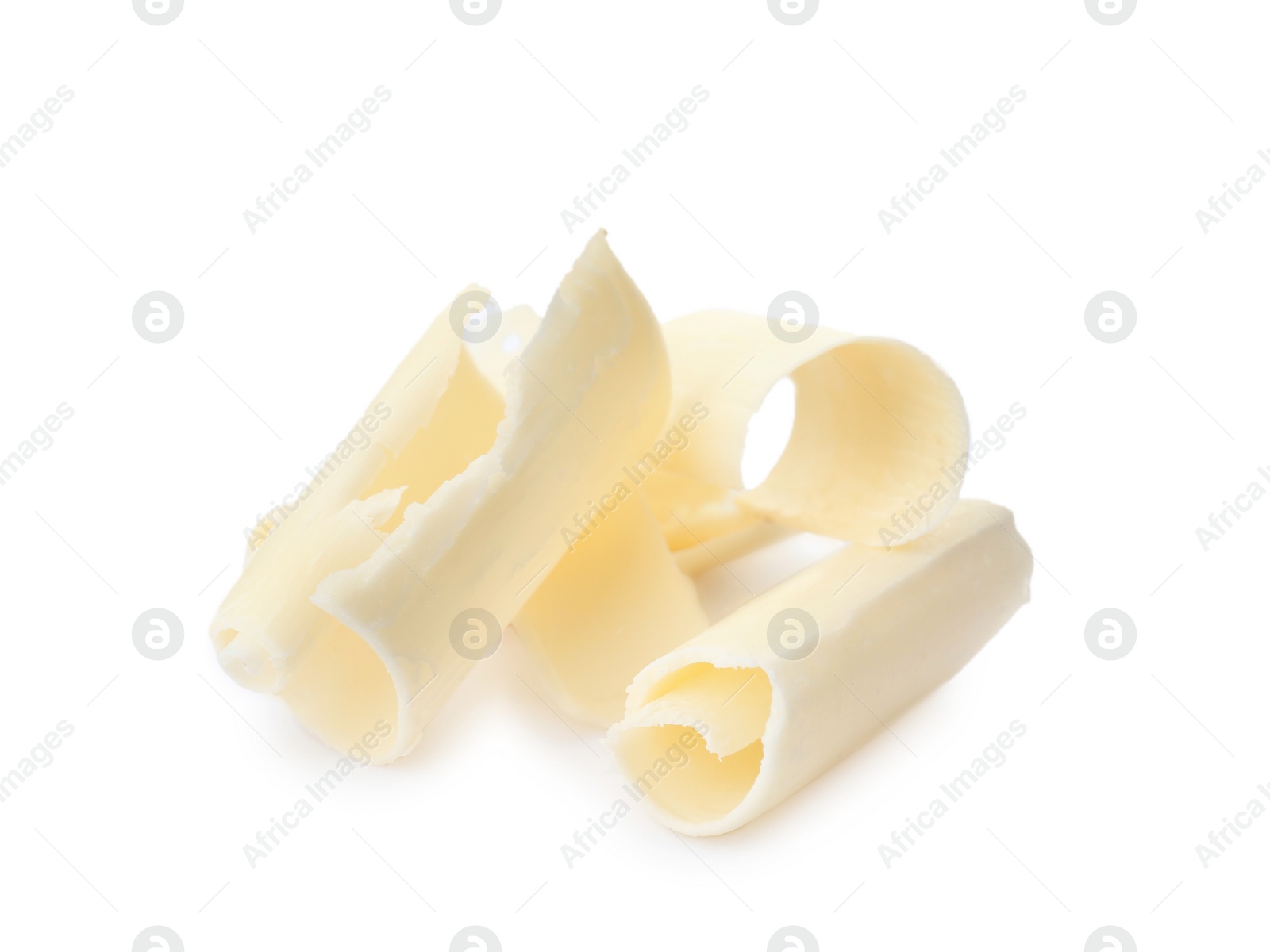 Photo of Delicious chocolate curls on white background