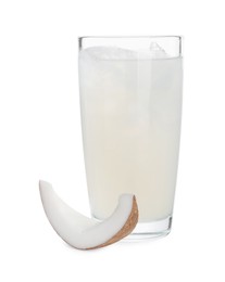 Photo of Glass of coconut water, ice cubes and nut isolated on white