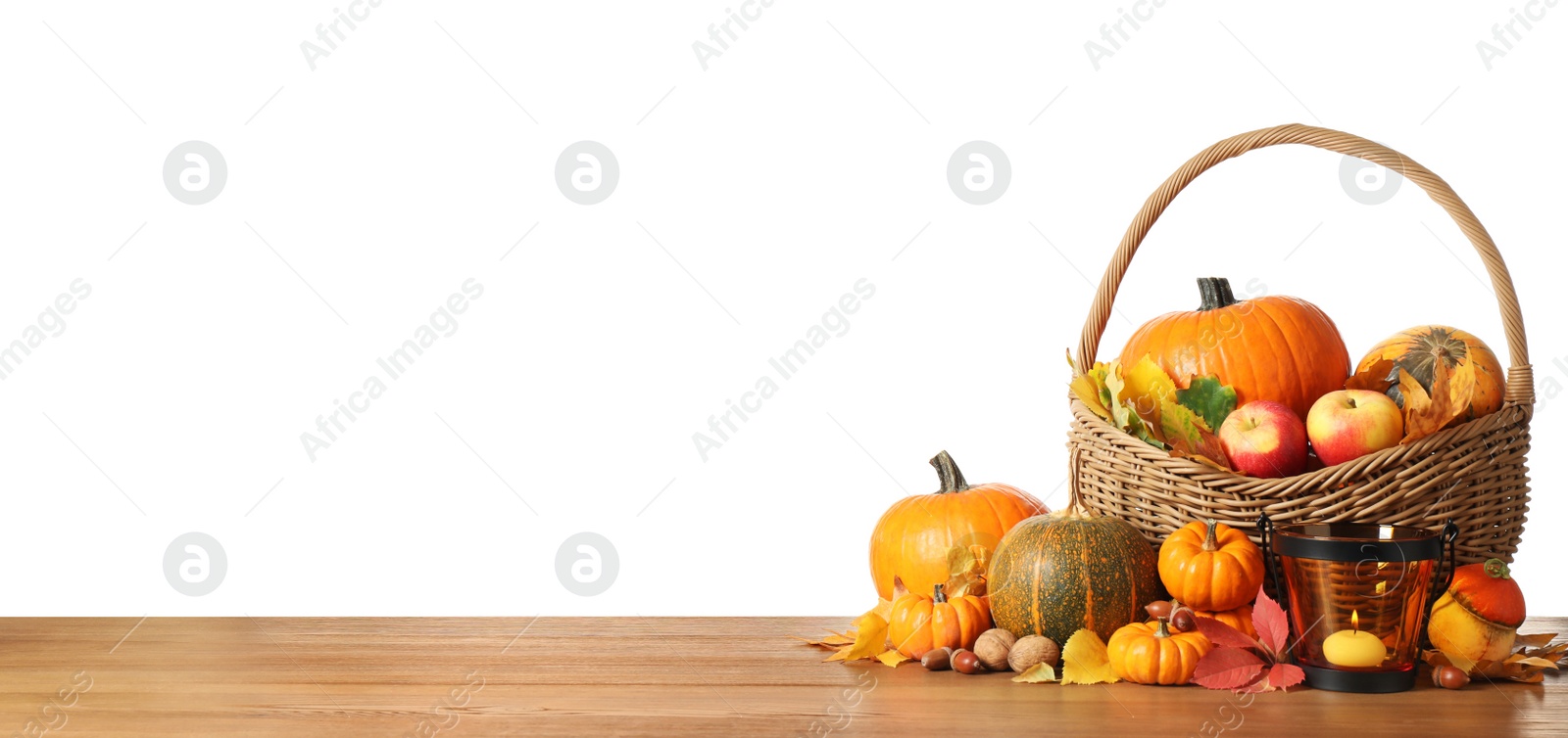 Photo of Composition with ripe pumpkins and autumn leaves on wooden table against white background. Happy Thanksgiving day