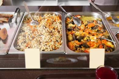 Photo of Containers with healthy food in school canteen