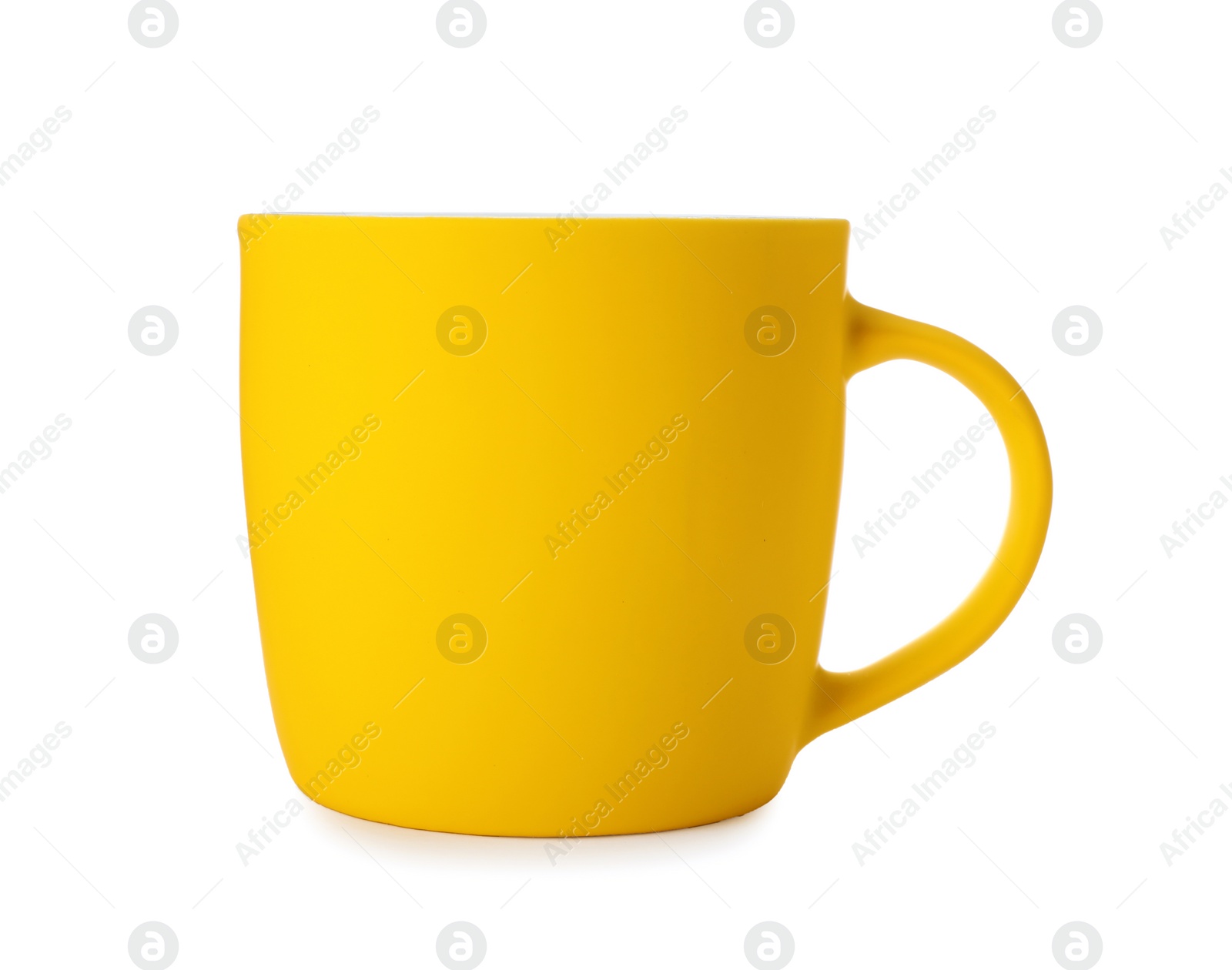 Photo of Yellow ceramic cup isolated on white