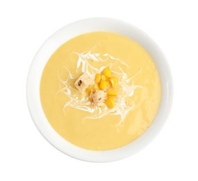 Photo of Delicious corn cream soup isolated on white, top view