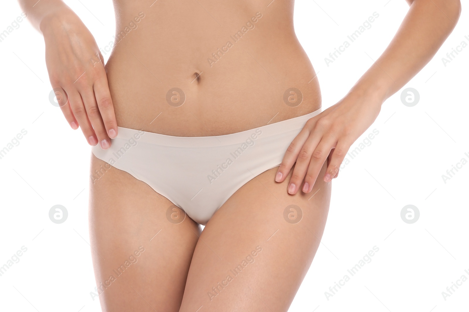 Photo of Young woman showing smooth skin after bikini epilation on white background