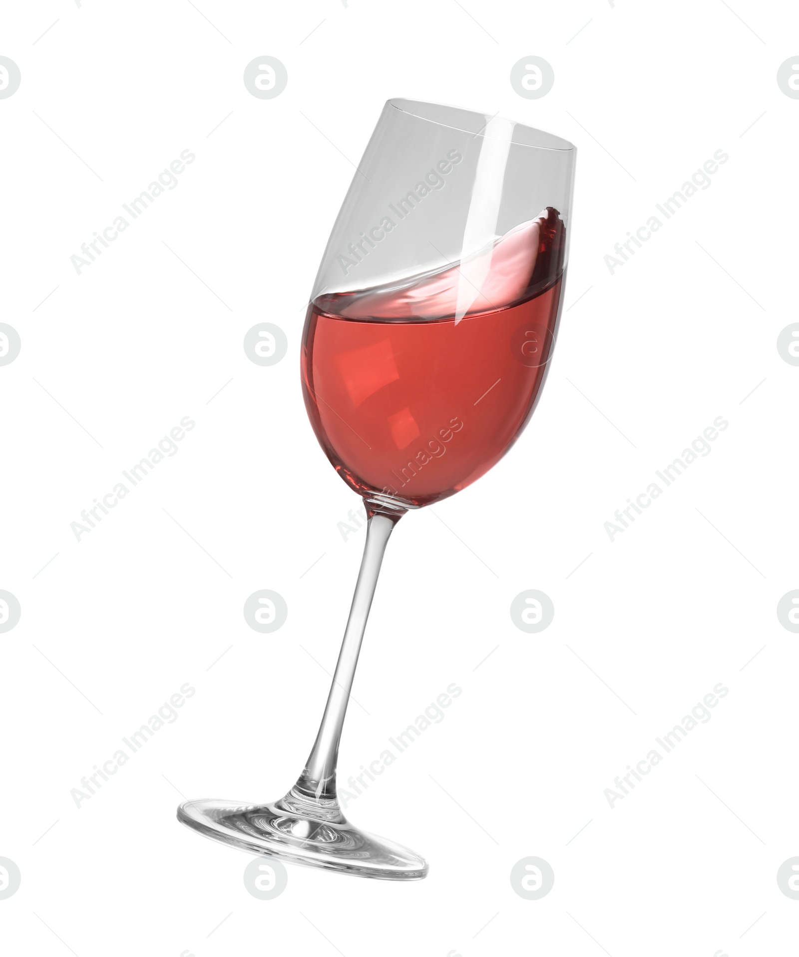 Photo of Glass with tasty dark rose wine isolated on white