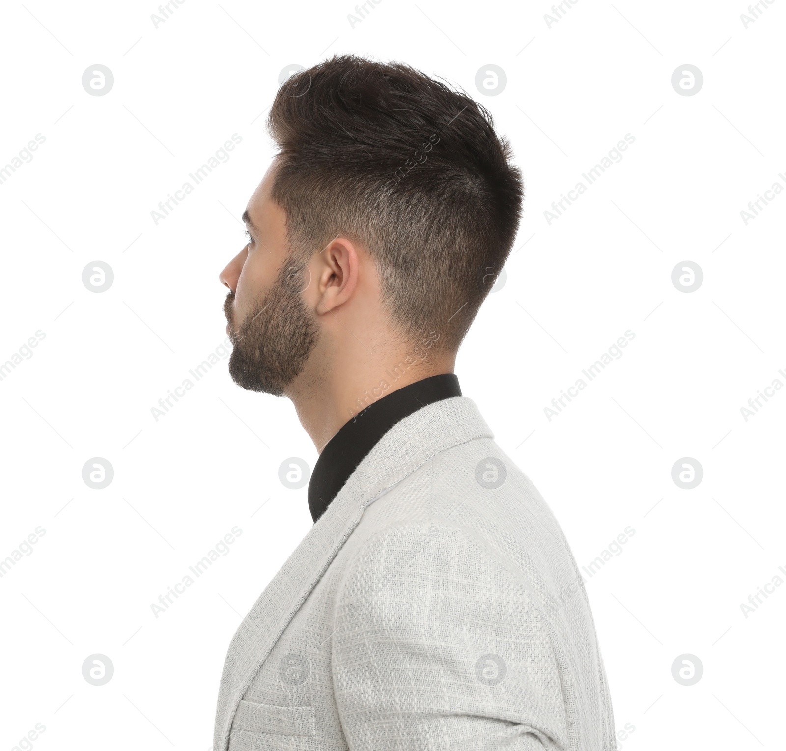 Photo of Young professional businessman in suit on white background