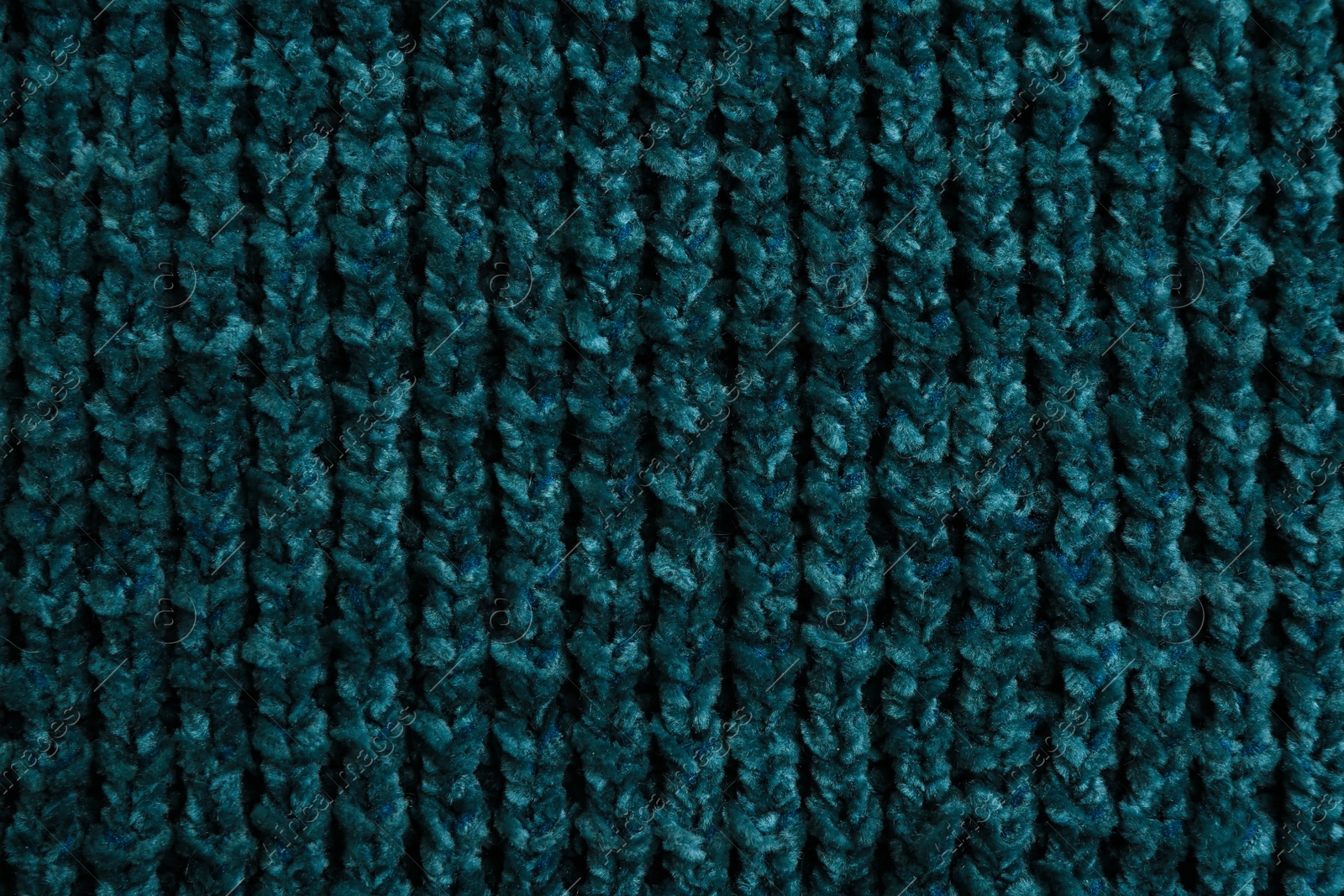 Photo of Beautiful dark knitted fabric as background, top view