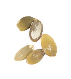 Photo of Raw peeled pumpkin seeds on white background, top view