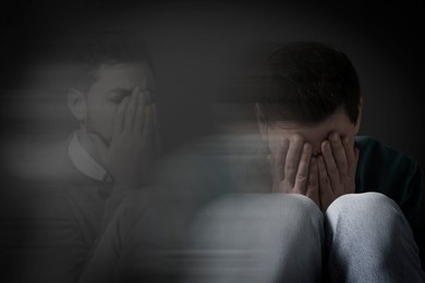 Image of Man suffering from mental illness on dark background. Dissociative identity disorder