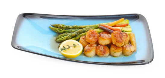 Photo of Delicious fried scallops with asparagus, vegetables, lemon and thyme isolated on white