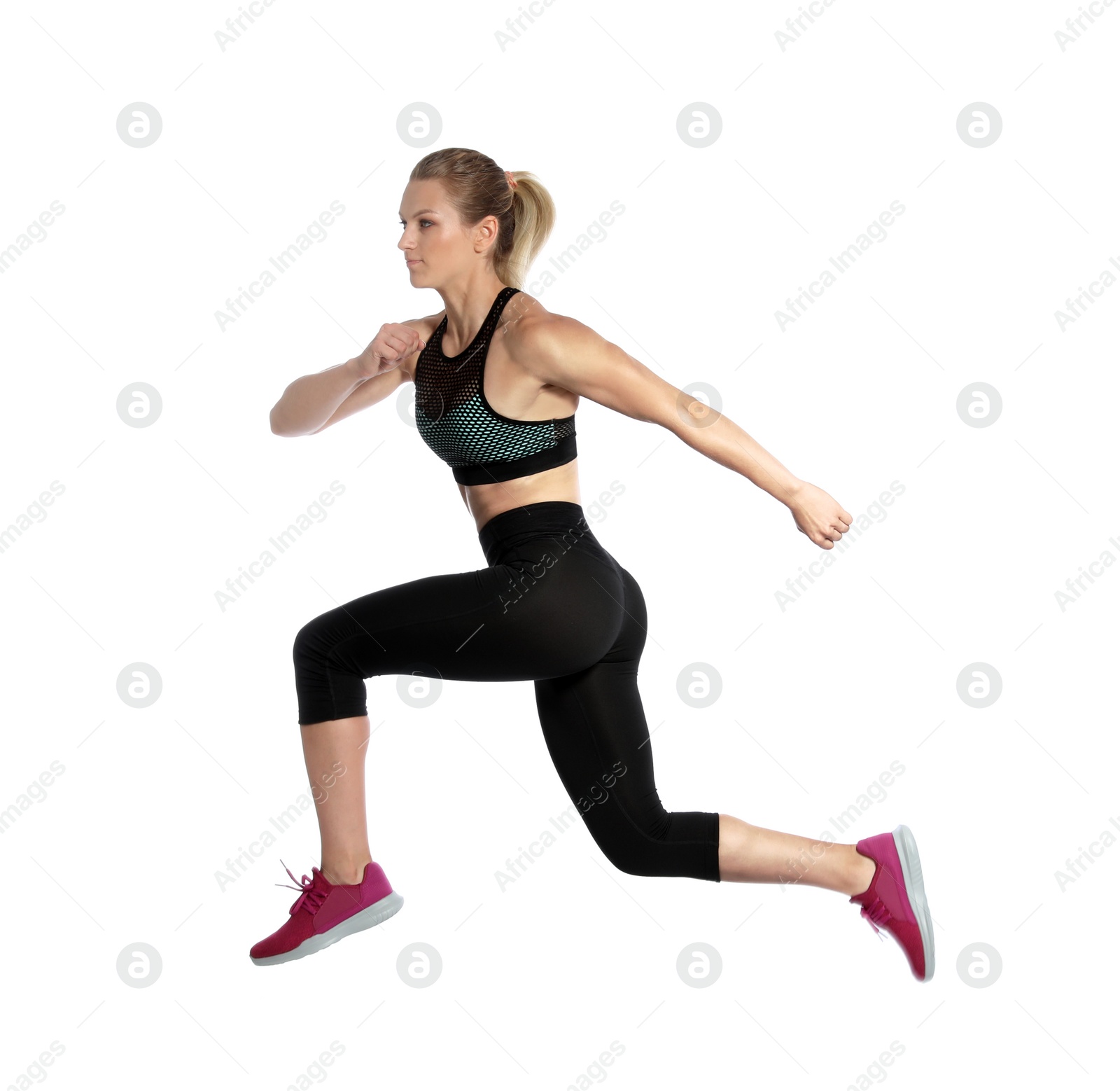 Photo of Sporty young woman running on white background