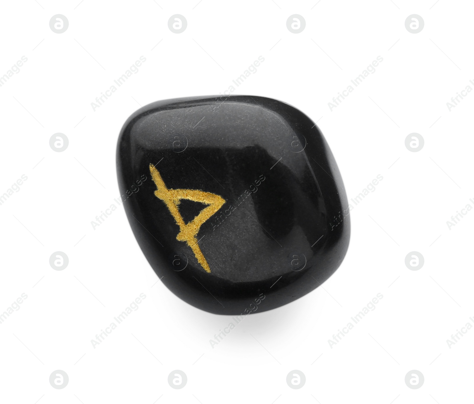 Photo of Black stone rune Thurisaz isolated on white