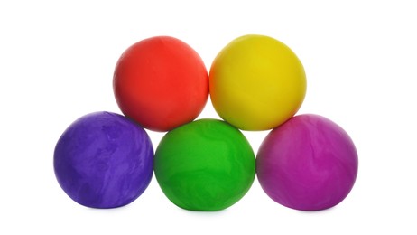 Photo of Different color play dough balls isolated on white