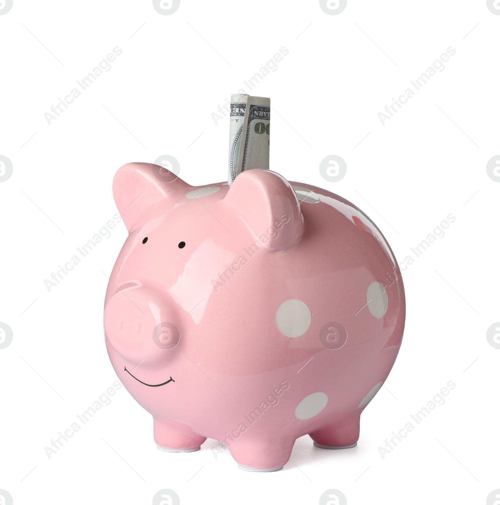 Photo of Money in piggy bank isolated on white