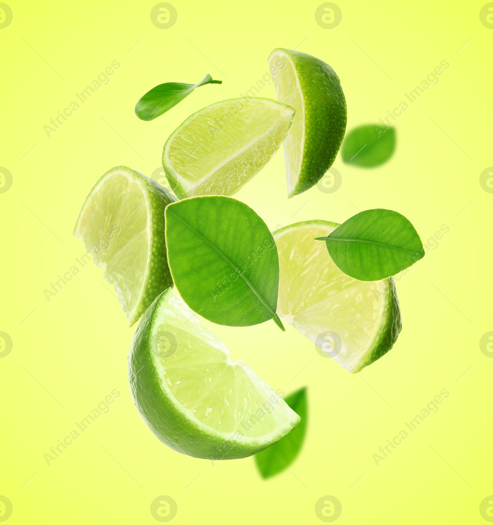 Image of Fresh lime slices and leaves falling on green yellow background