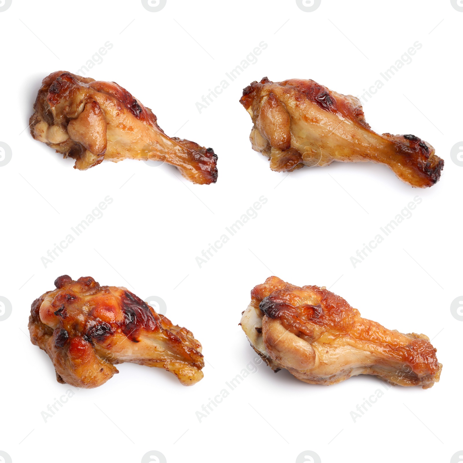 Image of Set with tasty roasted chicken wings on white background